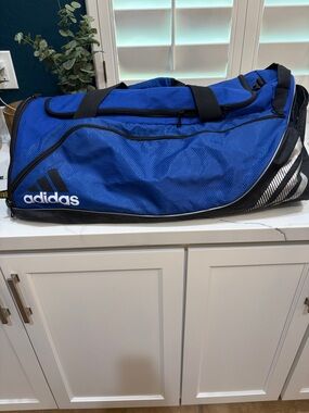 Adidas royal blue and black travel bag